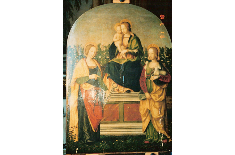 "Saints Agatha and Agnes with Madonna and Child" before cleaning and discovering angel. 15th century wooden altarpiece. Note paint loss and altered varnish.<br />Palazzo Colonna, Rome, Italy